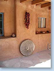 Photo of building with hanging chili peppers